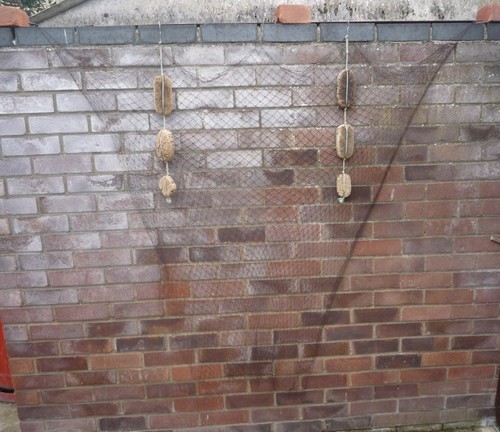 Three vintage cork floats - x,