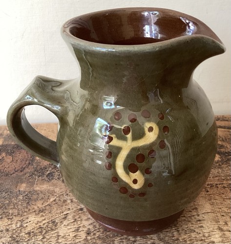 Stoneware jug green and - stoneware,