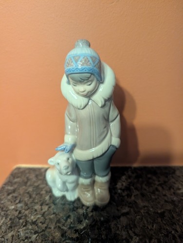 Lladro eskimo boy with - boy, pet"