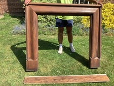 Antique timber fireplace surround