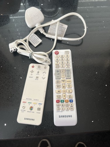 Geniune white remotes x 2 - tv,