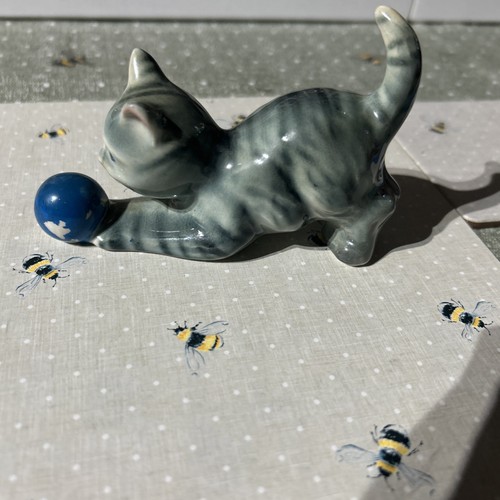Stripey cat playing with - cat, ball