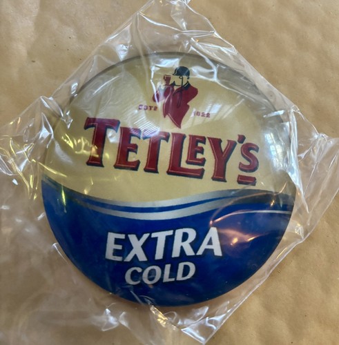 Tetleys extra cold - extra, fish