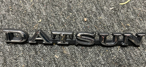 Datsun badge circa - ,