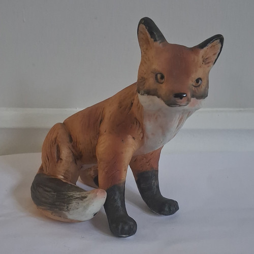 Realistic seated red fox - realistic,