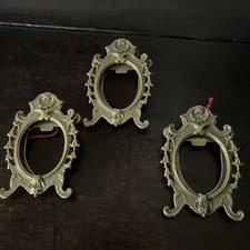 A Trio Of Brass Photo Frames
