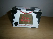 Vintage Russ Berrie Cow Belles ceramic cow figure. Mooing.small.14225(E14a)