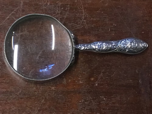Antique magnifying glass - magnifying,