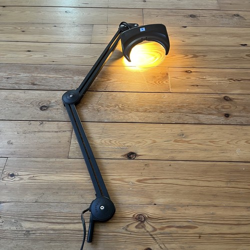 Magnifying swing arm the - swing,