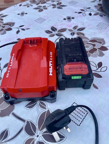 Hilti charger and battery - and,