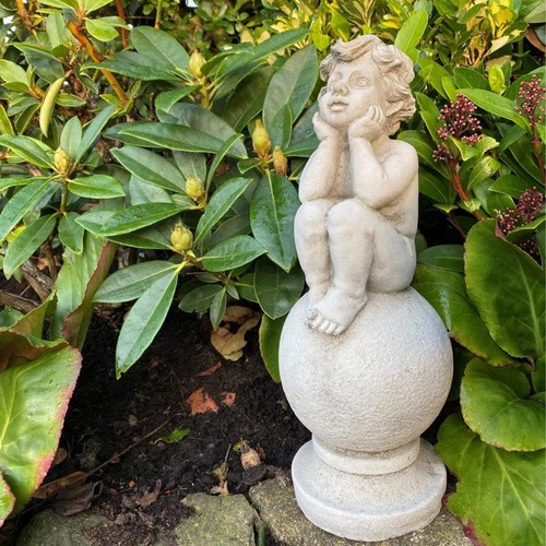 Adorable stone cast - stone, on