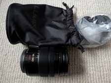Panasonic 14-140mm F3.5-5.6 Lens O.I.S. M43 in ex cond, bag, filter, hood.