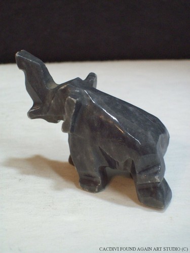 Elephant baby hand - hand, carved
