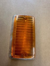 Ford Escort mk1 Indicator Lens, with chrome surround, genuine ford parts.