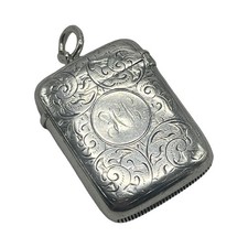 A Floral Engraved Silver Vesta