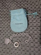 Please Return To Tiffany & Co