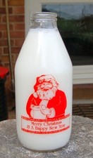 nice old " Santa Claus " Greetings " Hereford dairy milk bottle