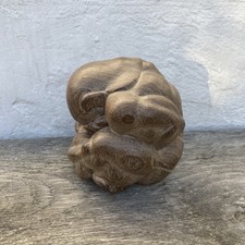 Weeping Buddha.  Carved wood.  4 inches. 