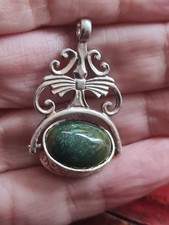 silver spinning fob pendant
