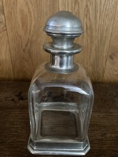 Stylish pewter and glass decanter