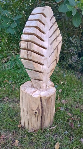 Carved feather art sculpture