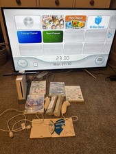 Nintendo Wii Bundle Wii Sports/Resort. 2 Controllers/motion Plus + 4 Other Games