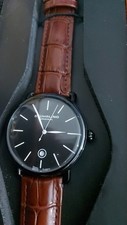 STUHRLING ORIGINAL ALL BLACK WATCH WITH BROWN LEATHER STRAP SWISS QUARTZ 