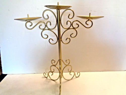 Ornate metal triple - triple, pillar