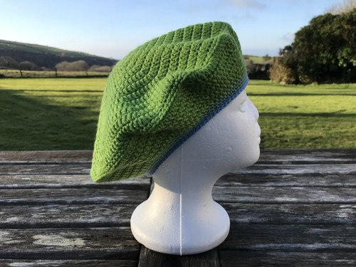 Green beret with - with, blue