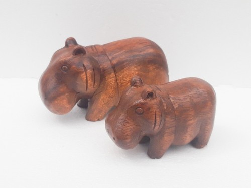 Hand carved hippo pair solid - hippo,