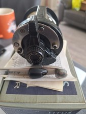 OKUMA Titus lever drag