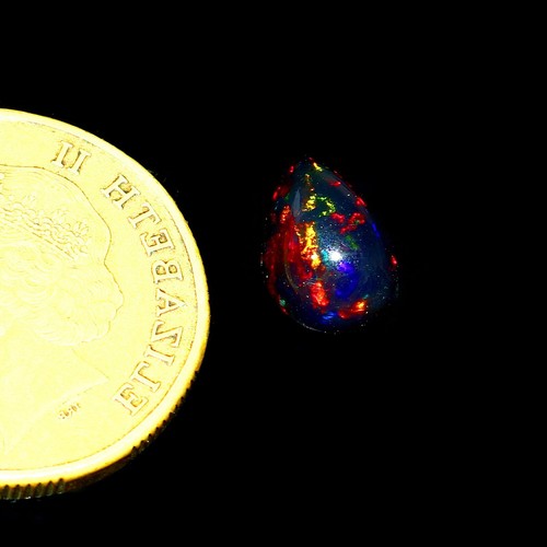 Natural red fire black opal - red,
