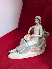 Casades figurine lady with fish