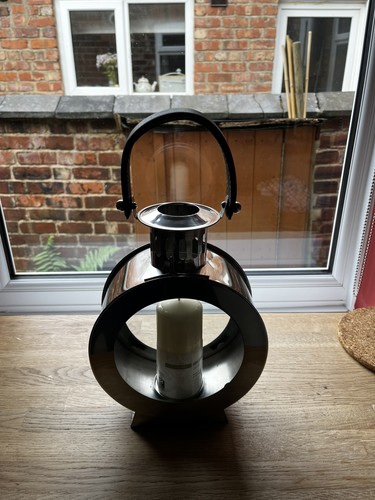 Silver and glass candle