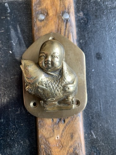 Brass door knocker - depicting, a