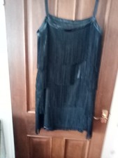 Black tasseled evening dress