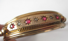 Victorian bangle set Etruscan revival with red glass stones