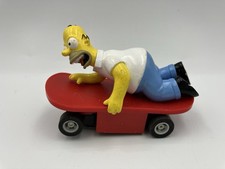 Micro Scalextric The Simpsons Homer On Skateboard Scale 1:64  12 volt motor