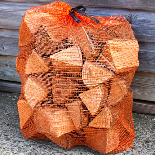 Bag firewood logs in - bag,