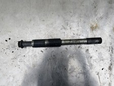 Front wheel spindle axle for a
