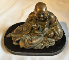 Vintage old Buddha Figurine On
