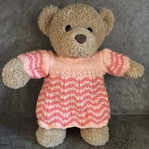 Hand knitted teddy bear - hand,