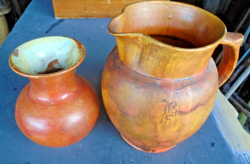 Two antique pottery vases one - two,