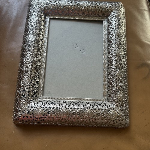 Ornate pierced silver metal - ornate,