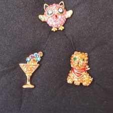 Butler And Wilson Trio Of Pins  Gold Tone And Multicoloured Crystals