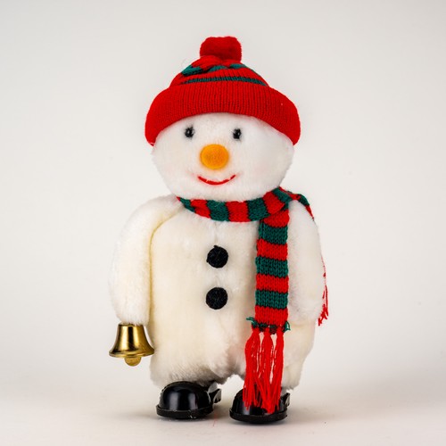 Snowman walking while - , playing