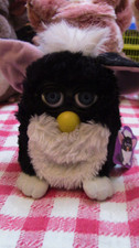 1998 Tiger Electronics black and white furby working but missing 1 ear frame