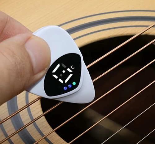 Guitar pick and tuner - in,