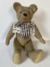 An Antique Tall Teddy Bear, A