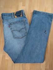 Levi's 513 distressed blue
